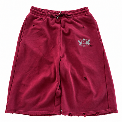 Wine Red distressed sweat shorts on a white background